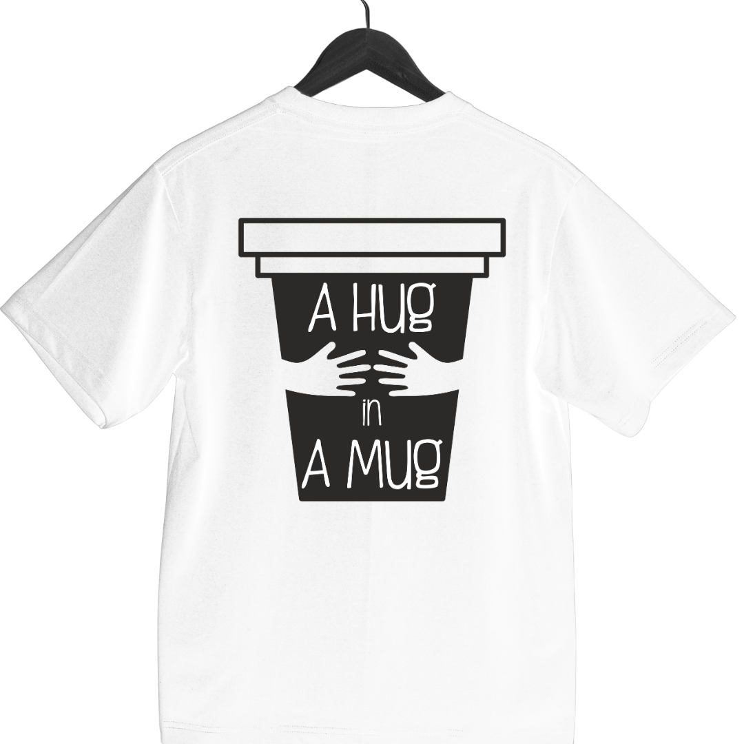 white tee featuring HUG IN A MUG cozy graphic design